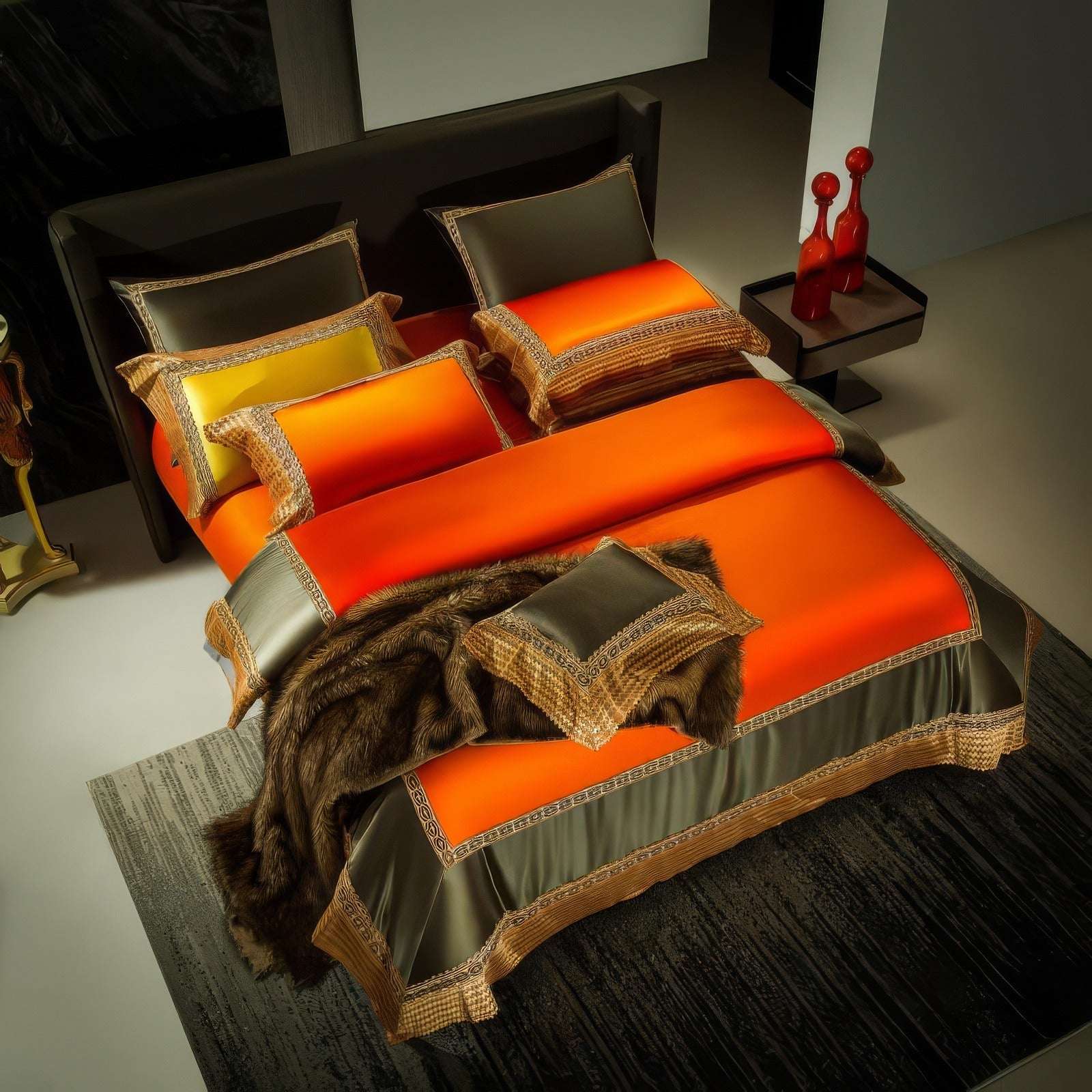 A luxurious bedding set in vibrant orange and olive green, adorned with intricate geometric embroidery along the edges. The set includes a matching pillow arrangement and a decorative faux fur accent on the bed.