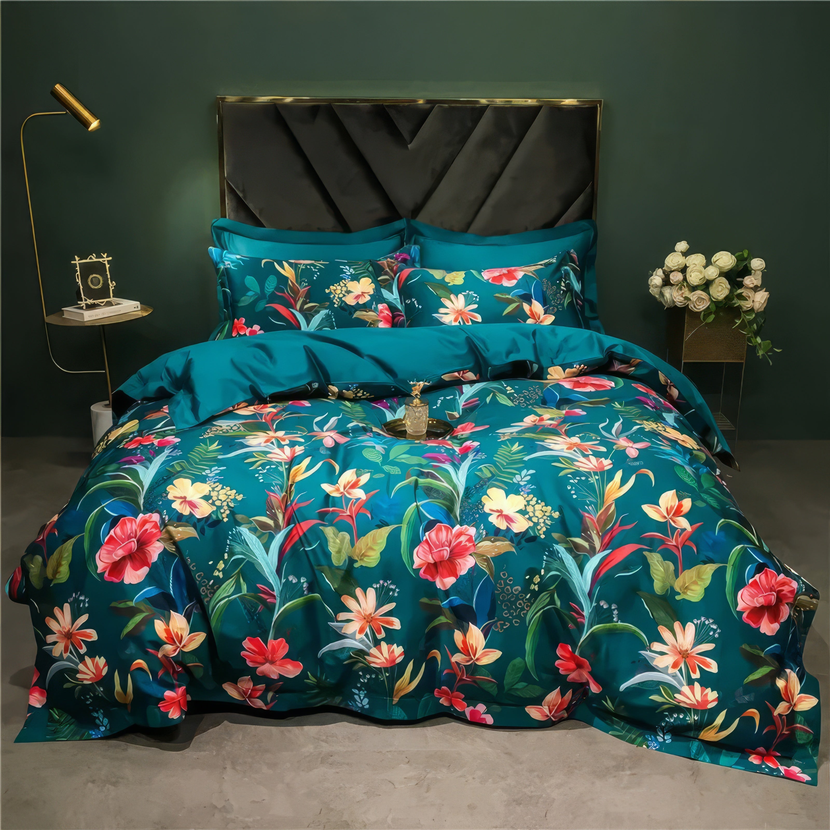 A vibrant bedding set made from Egyptian cotton featuring a rich teal base adorned with colorful tropical floral patterns. The design is complemented by matching pillowcases and a smooth, solid teal sheet. The backdrop includes a sophisticated black headboard, gold accent lamp, and fresh floral arrangements, creating an inviting and luxurious ambiance.

