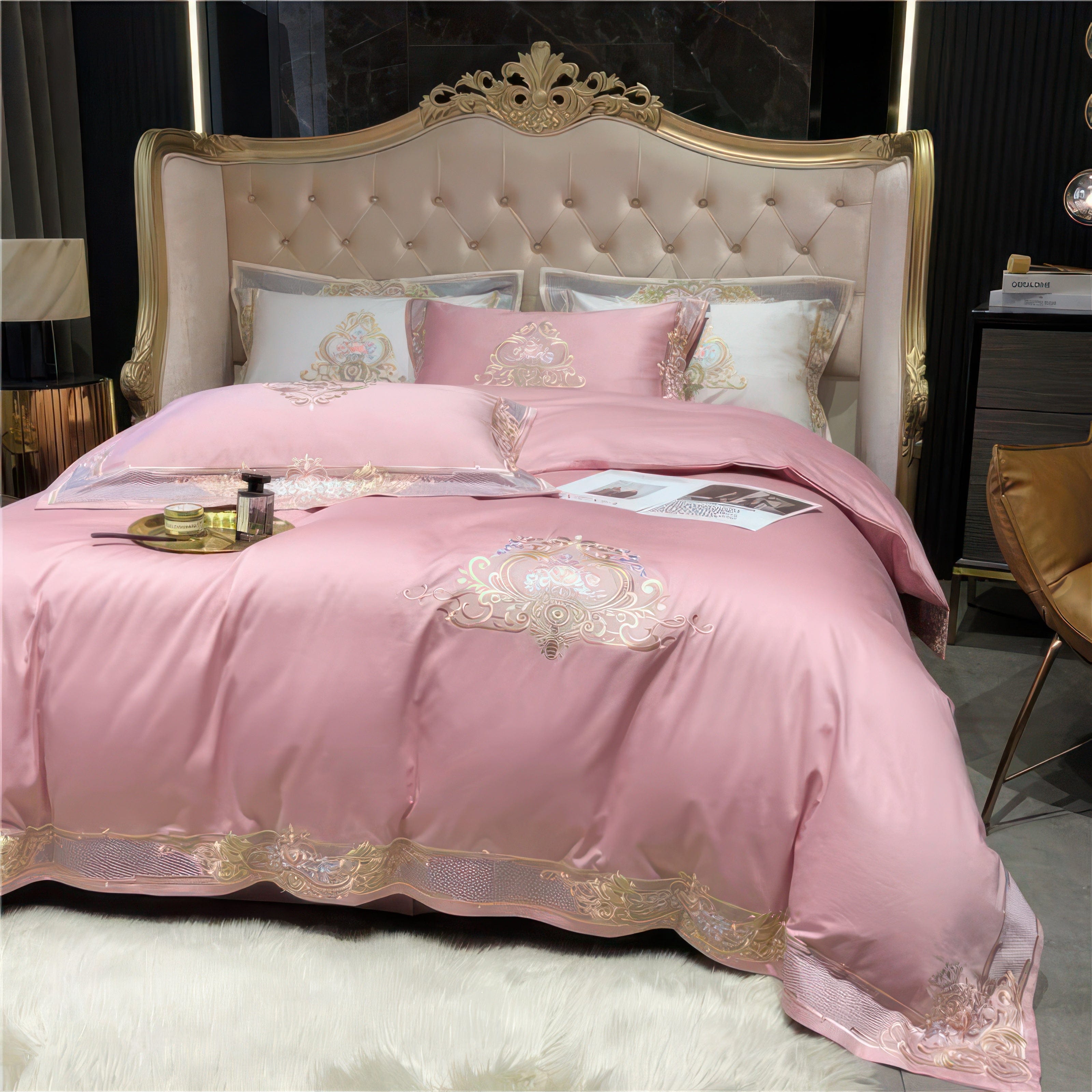 An exquisite bedroom showcasing a pink bedding set adorned with gold embroidery and intricate designs, exuding elegance and sophistication. The bed features a plush tufted headboard with ornate golden accents, creating a regal focal point. The room is styled with luxurious elements such as golden side tables, a soft white rug, and a modern armchair, harmonizing traditional and contemporary aesthetics for a refined atmosphere.

